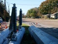 Folding Arms on a 150 foot high tension tower about to be installed.