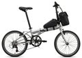 Folding bicycle with a compact and portable design, featuring a silver frame and black components. It has small wheels, a rear der Royalty Free Stock Photo