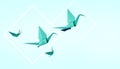 Folding birds Paper and peace on Pastel Green Background