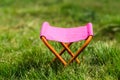 Folding camping stool in the park outdoor