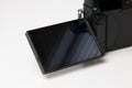 Flip out LCD screen on a modern mirrorless digital camera Royalty Free Stock Photo