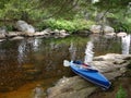 Folding kayak by shore