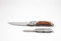 Folding knives on a white background Royalty Free Stock Photo