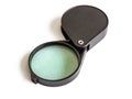Folding magnifier in a black plastic case Royalty Free Stock Photo