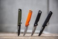 Folding penknives in different colors. Pocket knives for everyday carry. Various knives for hunting, sports and recreation. Wooden