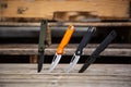 Folding penknives in different colors. Pocket knives for everyday carry. Various knives for hunting, sports and recreation. Wooden