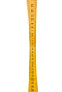 Folding ruler isolated, yellow carpenter`s rule with centimeters numbers. Royalty Free Stock Photo