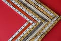 Antique folding rulers form a vector suggesting accuracy, measurement, metrics as a business concept with copy space.