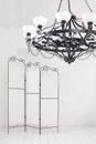 Folding screen and a black chandelier in a room Royalty Free Stock Photo