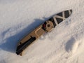 Folding tactical knife on white snow Royalty Free Stock Photo