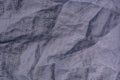 Folds of blue fabric textured background close up Royalty Free Stock Photo