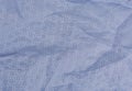 Folds of blue fabric textured background close up Royalty Free Stock Photo