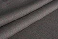 Folds of gray woolen cloth
