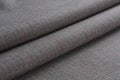 Folds of gray woolen cloth