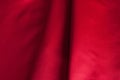 Folds of red silk fabric