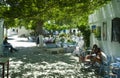 Pretty shaded square in the old town of the charming Greek island of Folegandros