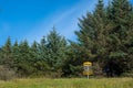 Folf field basket in the forest Royalty Free Stock Photo