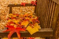 A foliage pillow on a bench in a woodland Royalty Free Stock Photo