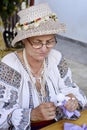 Folk female artist from Salaj, Romania dressed in the traditional Romanian blouse