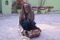 A folk singer is singing folk song .