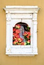 Folk votive shrine with the sacred image of the blessed virgin Royalty Free Stock Photo