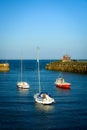 Folkestone harbor view, England - with three boats Royalty Free Stock Photo
