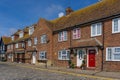 Red brick rowhouses on the harborfront of Folkestone Royalty Free Stock Photo