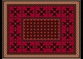 Burgundy carpet with ethnic ornaments with patterns of crimson flowers on the border and orange brown frame the edges