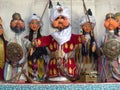 Folkloric marionettes of a sultan and his court to Bukhara in Uzbekistan.