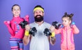 Follow father. Girls cute kids exercising with dumbbells with dad. Motivation and sport example concept. Children repeat