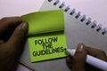 Follow The Guidelines text on sticky notes isolated on office desk Royalty Free Stock Photo