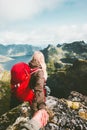 Follow hands holding couple hiking in mountains