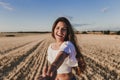 Follow me. Young woman holding hand and leading man to the beautiful nature sunset yellow landscape. View from back side, POV. Royalty Free Stock Photo