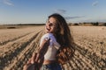 Follow me. Young woman holding hand and leading man to the beautiful nature sunset yellow landscape. View from back side, POV. Royalty Free Stock Photo