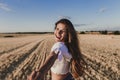 Follow me. Young woman holding hand and leading man to the beautiful nature sunset yellow landscape. View from back side, POV. Royalty Free Stock Photo