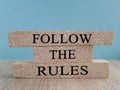 Follow the rules symbol. Concept words Follow the rules on brick blocks