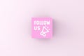 Follow us message on a pink cube block. Social Media Networking Internet Online Concept Royalty Free Stock Photo