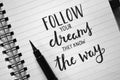 FOLLOW YOUR DREAMS THEY KNOW THE WAY hand-lettered in notebook Royalty Free Stock Photo