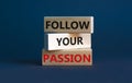 Follow your passion symbol. Concept words Follow your passion on blocks on beautiful grey table grey background. Business, Royalty Free Stock Photo