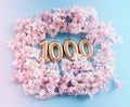 1000 followers card. Template for social networks, blogs. Background with pink flower petals