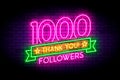 1000 followers neon sign on the wall.