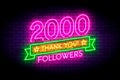 2000 followers neon sign on the wall.