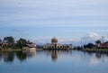 A magnificent mosque at the end of a large pond