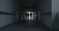 Following shot of doctors walking along the clinic hallway Royalty Free Stock Photo