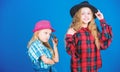 Following sister in everything. Cool cutie fashionable outfit. Happy childhood. Kids fashion concept. Check out our Royalty Free Stock Photo