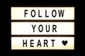Folow your heart hanging light box Royalty Free Stock Photo