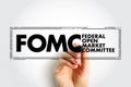 FOMC Federal Open Market Committee acronym - committee within the Federal Reserve System, conducts monetary policy for the U.S.