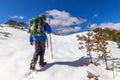 Foncebadon, Spain - Young Pilgrim Girl Trudging through the Snow along the Way of St James Camino de Santiago