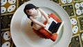 Fondant cupcake featuring girl typing a laptop