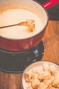 Fondue Moitie-Moitie made with original Swiss Recipe and with cube bread on the side Royalty Free Stock Photo